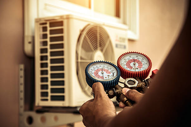 Professional Air Conditioning Service technician working in Cross Plains, WI